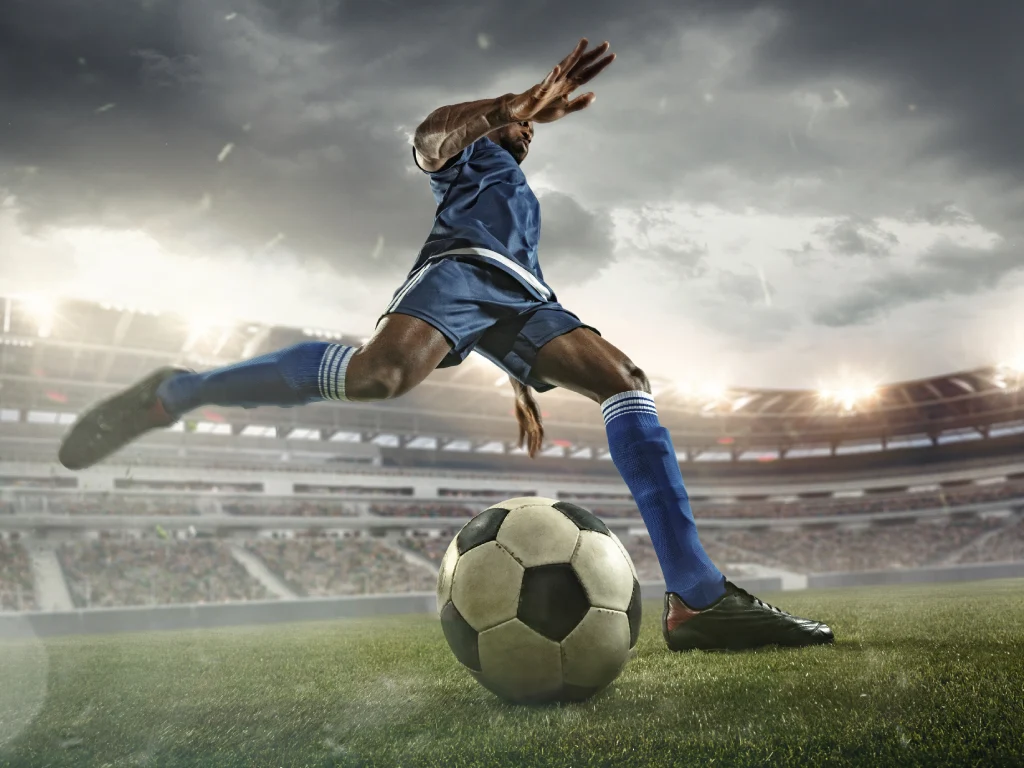Athlete experiencing knee pain from an ACL injury during sports activity