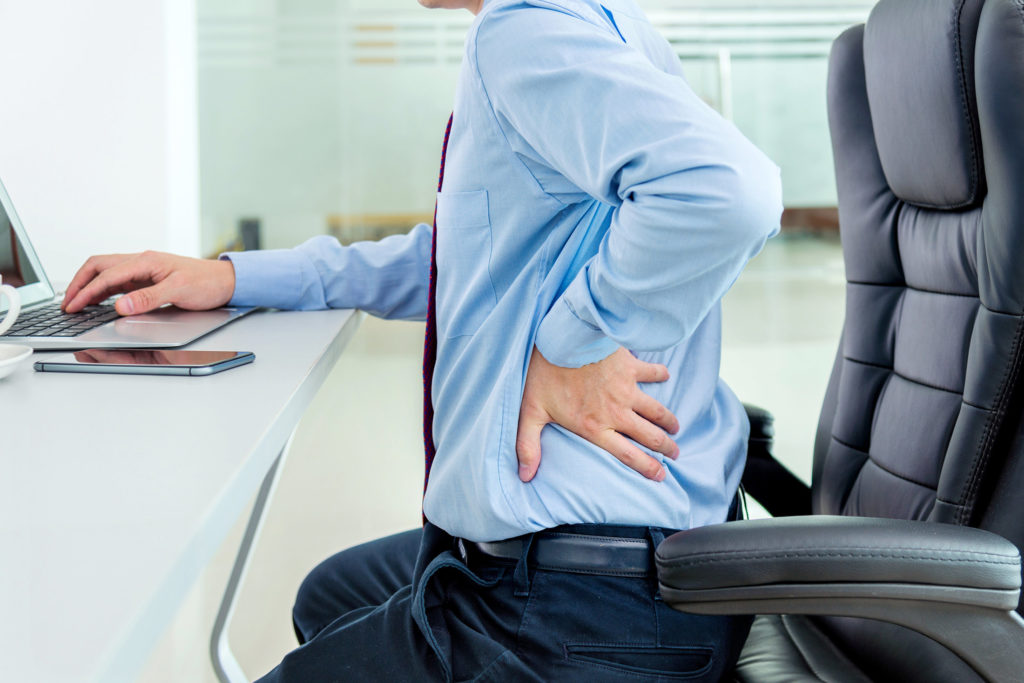 person back pain from working